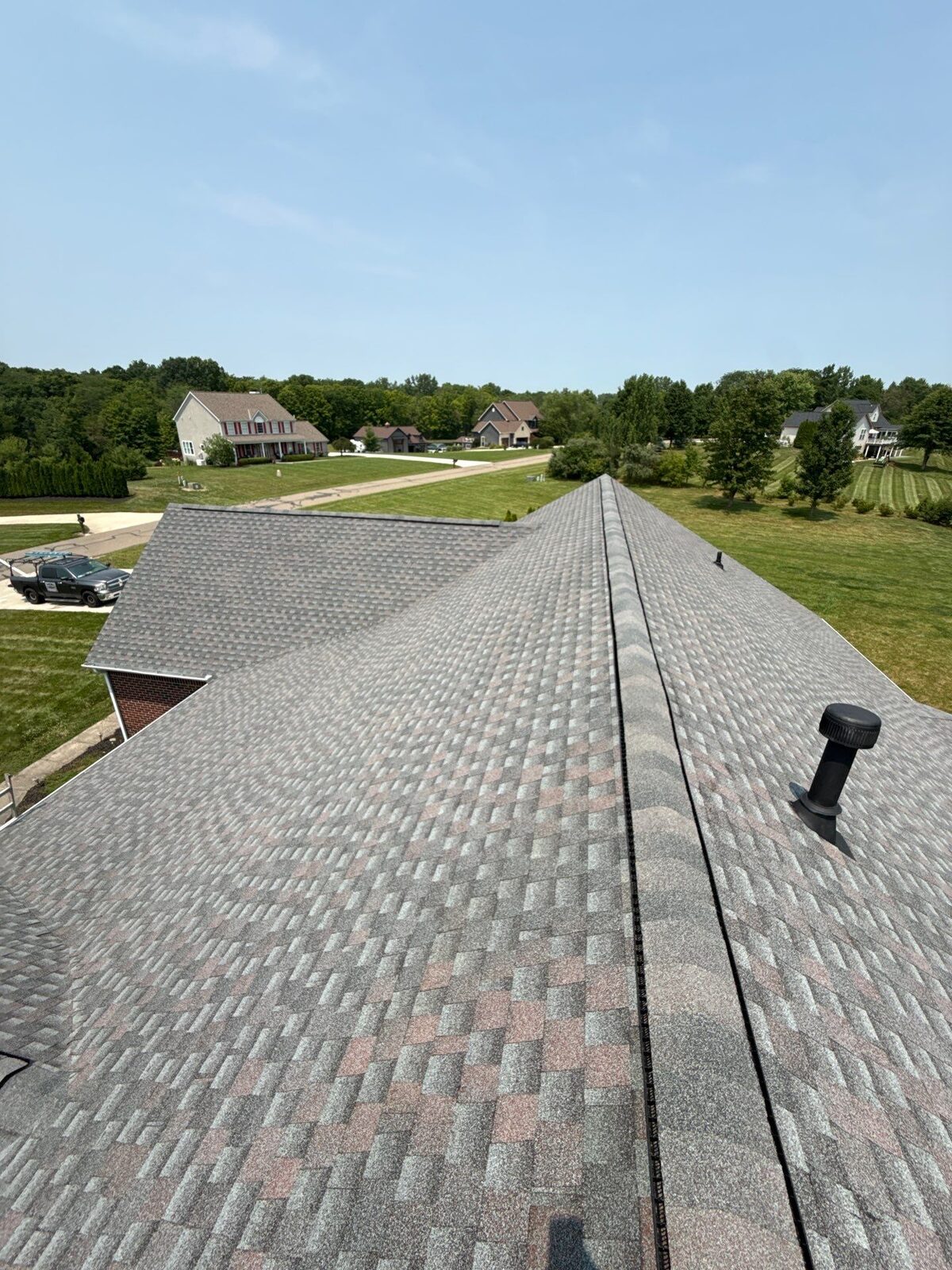 Looking down the finished ridge line over the neighborhood